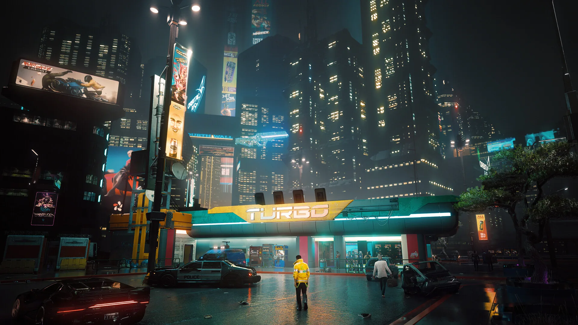 夜之城街景 霓虹灯牌密布的夜之城街道,雨夜里色彩浓烈
